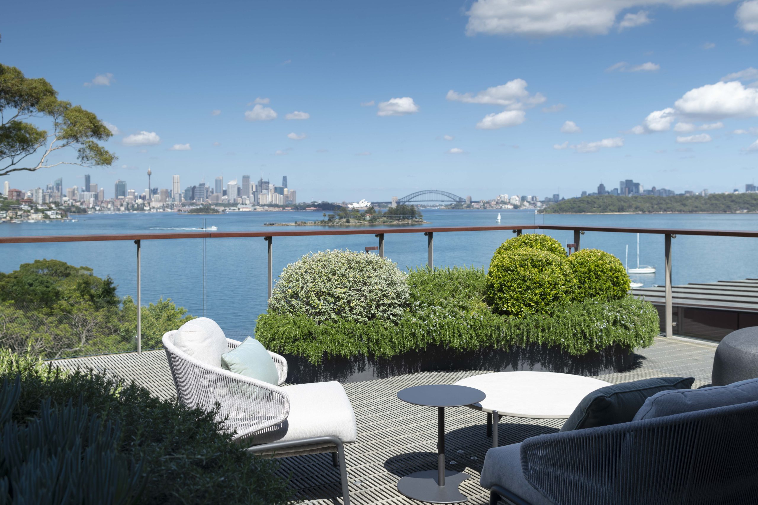 An elegant garden enjoys premium views of Sydney’s Harbour Bridge. Hardwearing succulents provide privacy and protection from the elements.