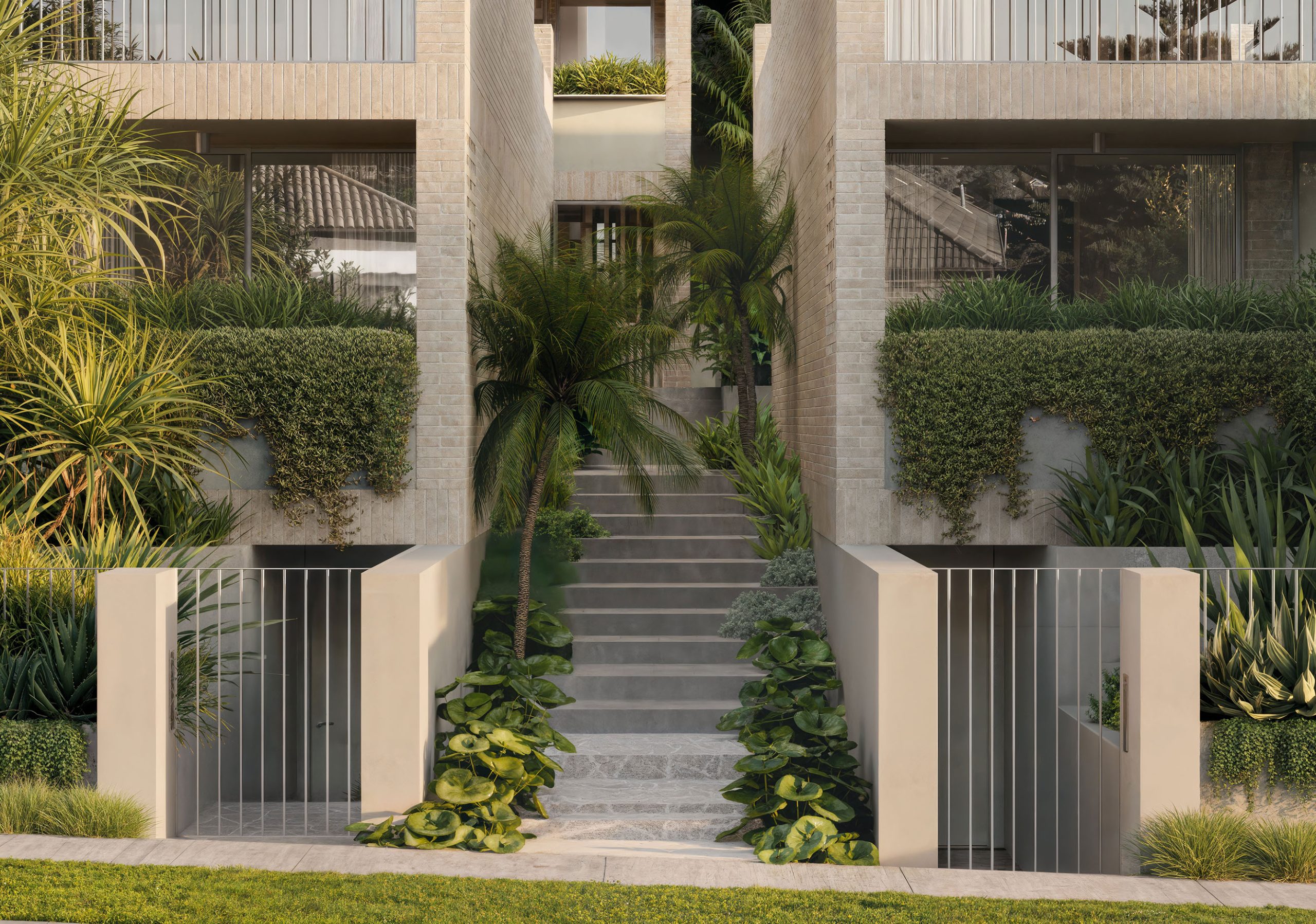 multi residential development landscaped entrance with stairs, palms and plants.